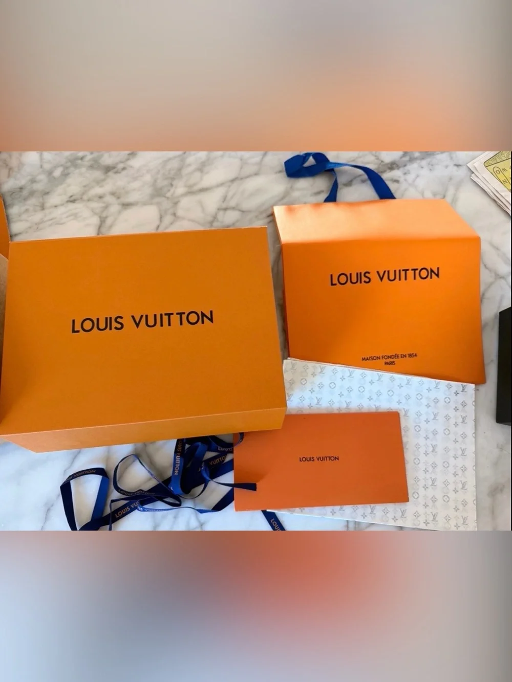 Louis Vuitton Orange Gift Packaging with Blue Ribbons
